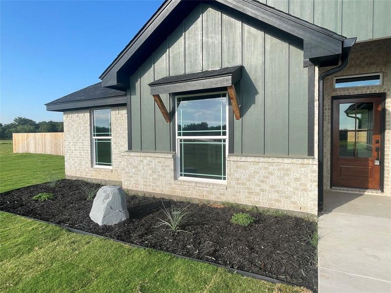 Front exterior of a new home in , Clyde, TX, highlighting curb appeal (Image 18).