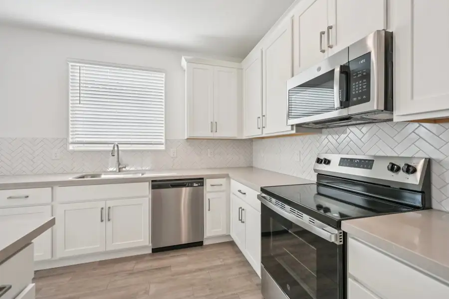 Kitchen featuring the Timeless Collection . Not actual home, finishes may vary by community. Kitchen featuring the Timeless Collection . Not actual home, finishes may vary by community.