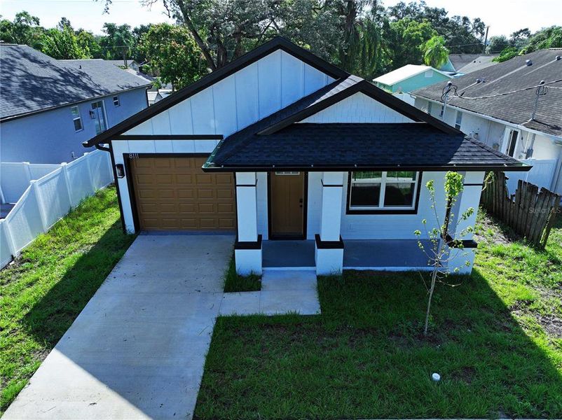 Front exterior of a new home in , Tampa, FL, highlighting curb appeal (Image 14). Front exterior of a new home in , Tampa, FL, highlighting curb appeal (Image 14).