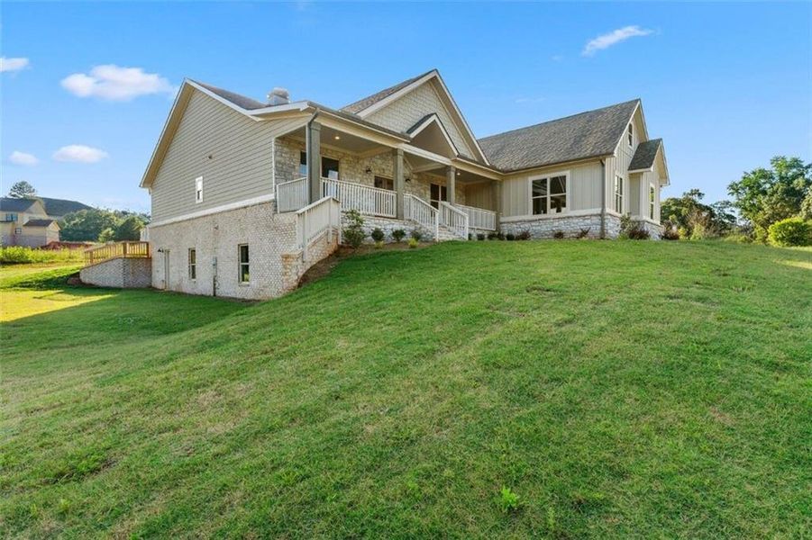 Exterior details and patio area of a home in SteepleChase, Hoschton (Image 22).