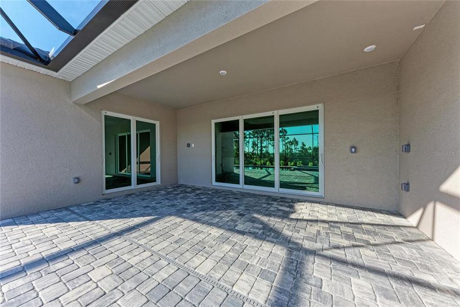 Exterior details and patio area of a home in Wellen Park Golf & Country Club: Executive Homes, Venice (Image 26).
