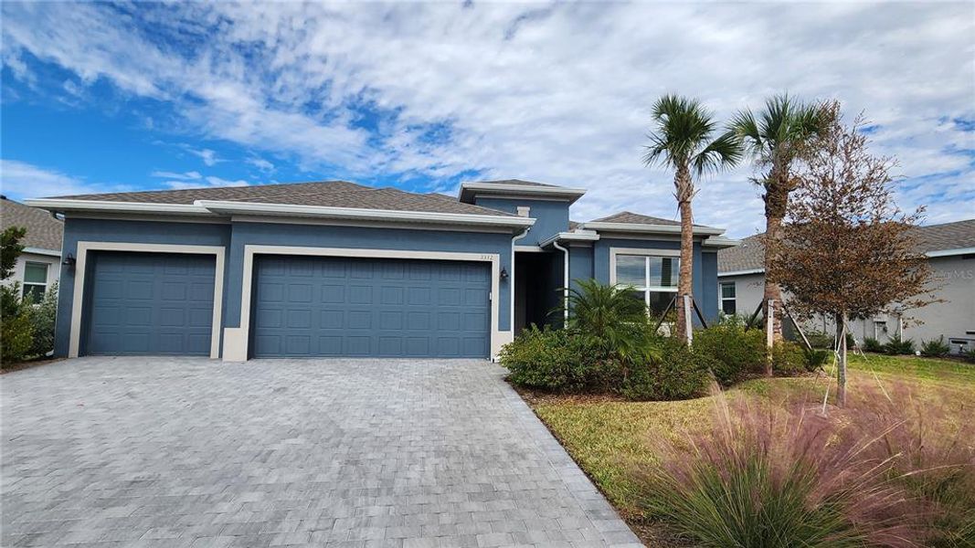 Front exterior of a new home in , Parrish, FL, highlighting curb appeal (Image 2). Front exterior of a new home in , Parrish, FL, highlighting curb appeal (Image 2).