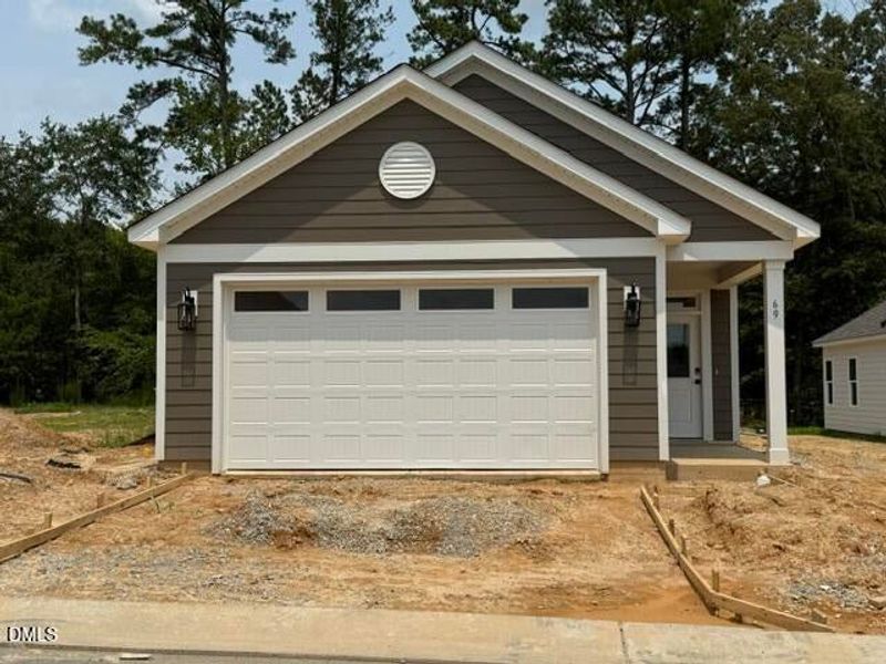 In-progress construction of a new home in The Walk at East Village, Clayton, NC (Image 18).