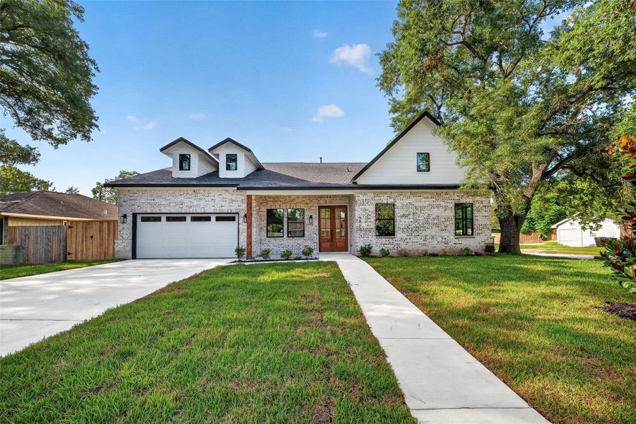 Front exterior of a new home in , Houston, TX, highlighting curb appeal (Image 25). Front exterior of a new home in , Houston, TX, highlighting curb appeal (Image 25).