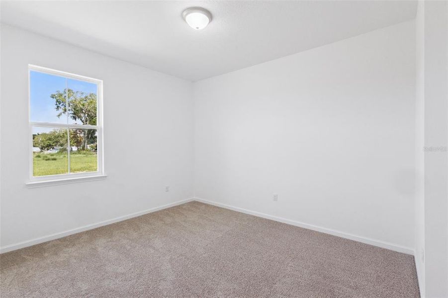 Spacious, unfurnished interior of a new home in Grand Isle, Grand Island (Image 20).