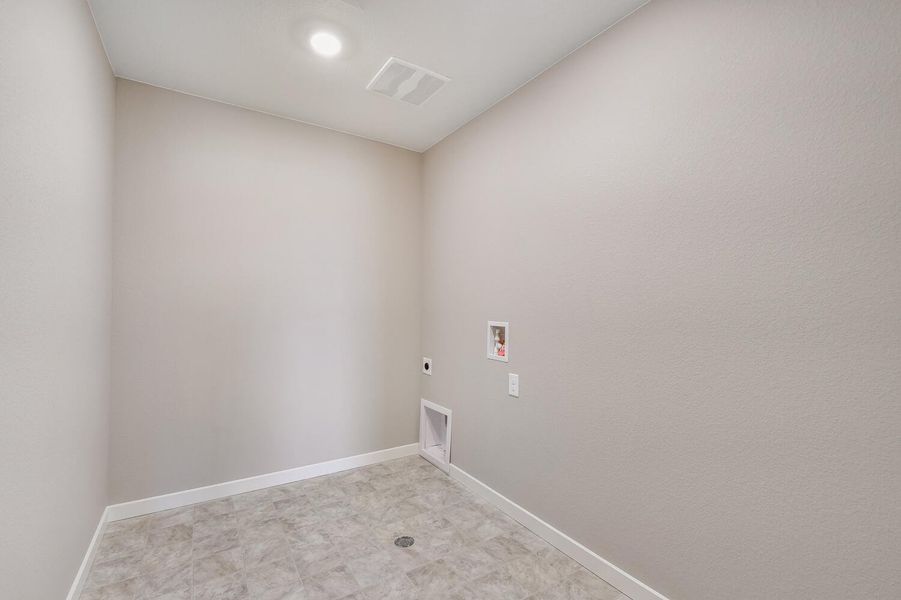 Representative unfurnished interior of a home built from the Holcombe by D.R. Horton in Brighton Crossing, Brighton (Image 27).