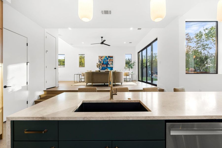 Kitchen opens into the living area level