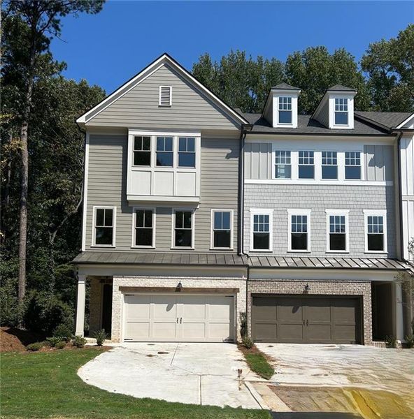 Front exterior of a new home in Devin's Shire - A Kennesaw Tradition, Kennesaw, GA, highlighting curb appeal (Image 2). Front exterior of a new home in Devin's Shire - A Kennesaw Tradition, Kennesaw, GA, highlighting curb appeal (Image 2).