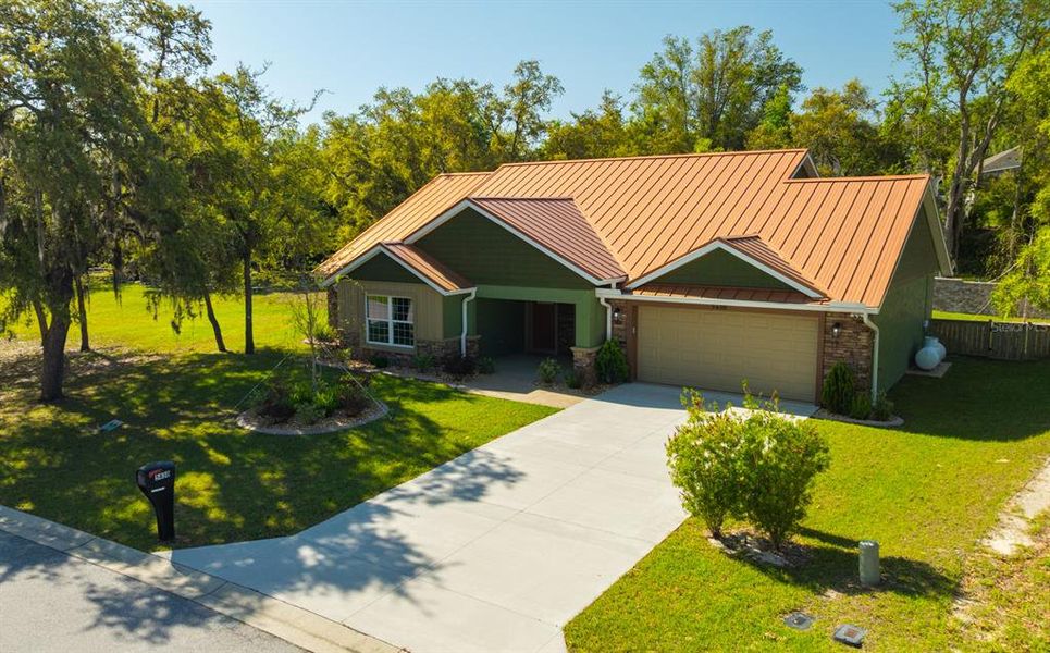 Front exterior of a new home in , Lecanto, FL, highlighting curb appeal (Image 21).
