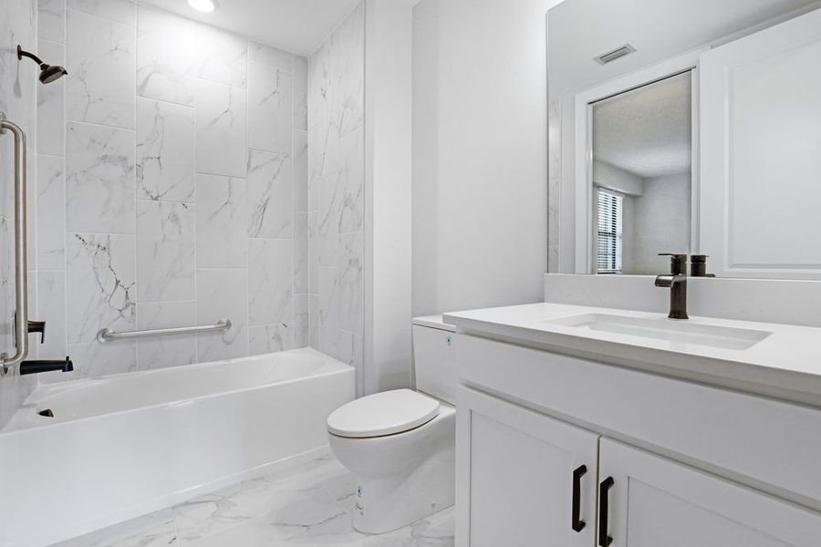 Furnished interior view inside a new home in Esplanade by the Islands Coach Homes, Naples (Image 4).