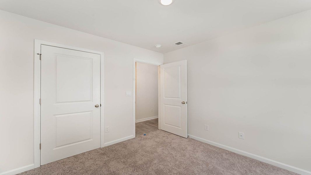 Representative unfurnished interior of a home built from the WYETH by D.R. Horton in Cottonwood Place, Tabor City (Image 14).