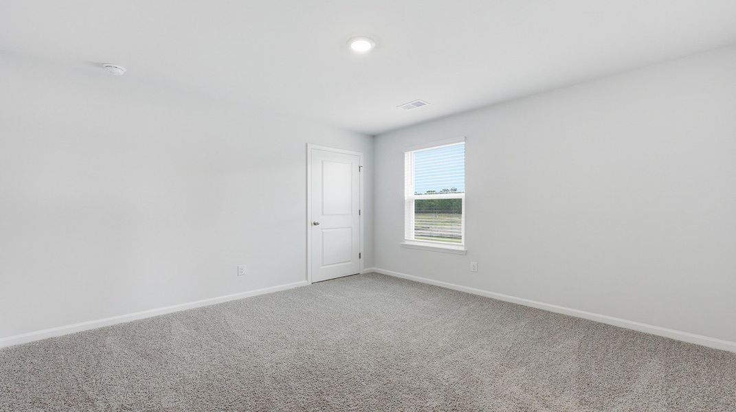 Representative unfurnished interior of a home built from the Hanover by D.R. Horton in The Ranch, Holly Hill (Image 24).
