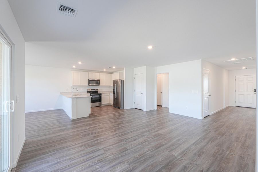 A large empty kitchen. A large empty kitchen.