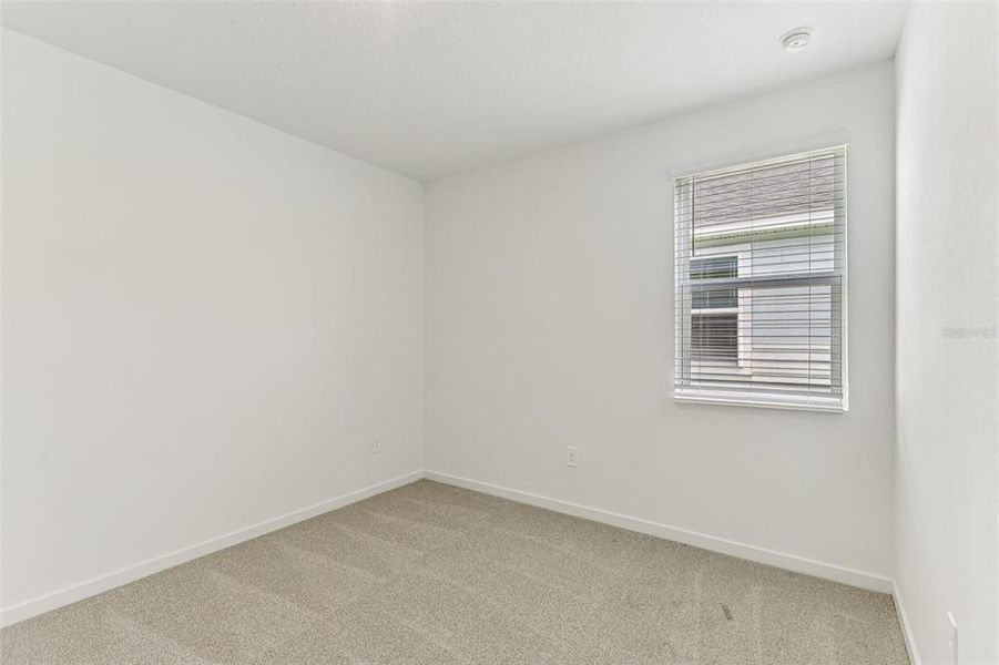 Spacious, unfurnished interior of a new home in Colbert Landings, Palm Coast (Image 21).
