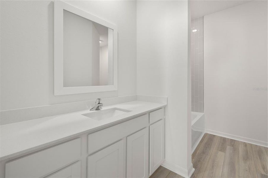 Furnished interior view inside a new home in Tula Parc, Astatula (Image 5).