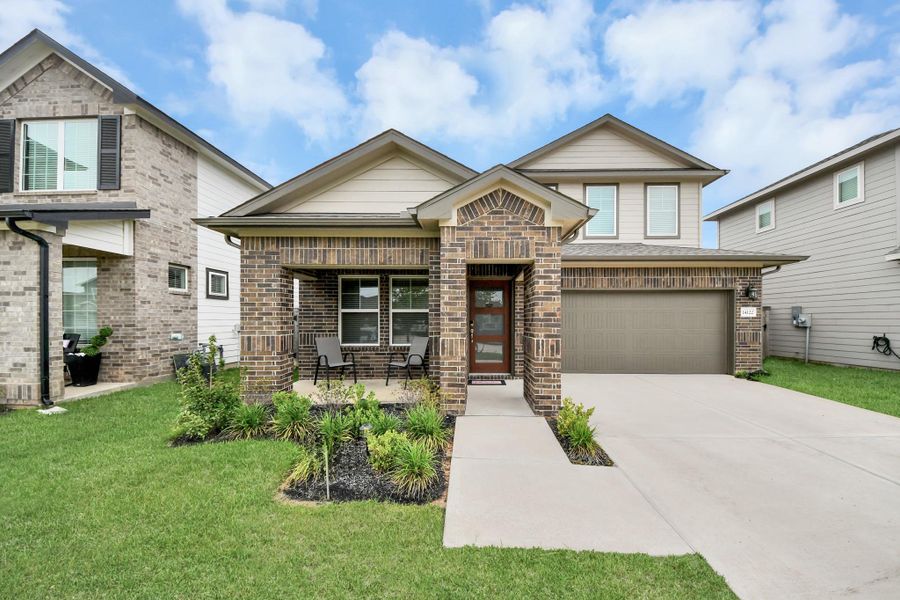 Front exterior of a new home in Magnolia Place, Magnolia, TX, highlighting curb appeal (Image 22).