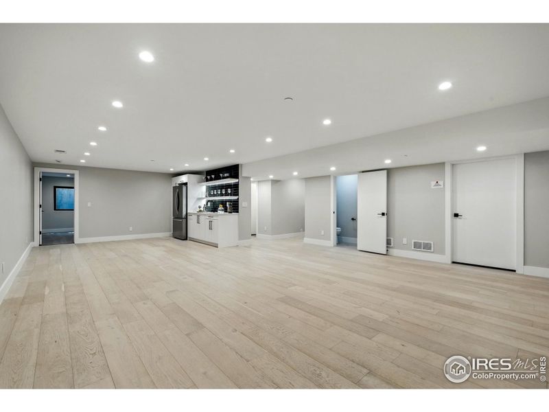 Basement family room + powder room Basement family room + powder room