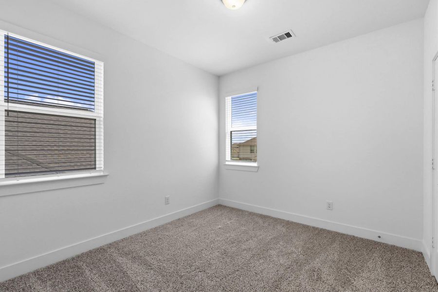 Spacious, unfurnished interior of a new home in Parkside on the River, Georgetown (Image 55).