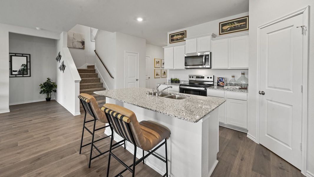 Representative furnished interior of a home built from the Midland by D.R. Horton in Frontier Pointe, Princeton (Image 5).