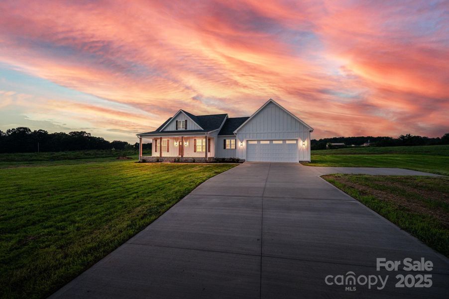 Front exterior of a new home in , Vale, NC, highlighting curb appeal (Image 31).