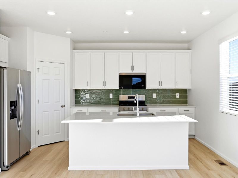 Furnished interior view inside a new home in Buffalo Highlands: The Flora Collection, Commerce City (Image 8).