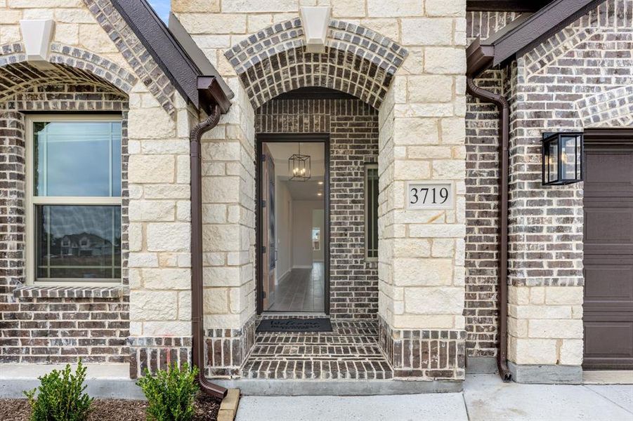 Front exterior of a new home in Georgetown at Kings Fort 60s, Kaufman, TX, highlighting curb appeal (Image 2).