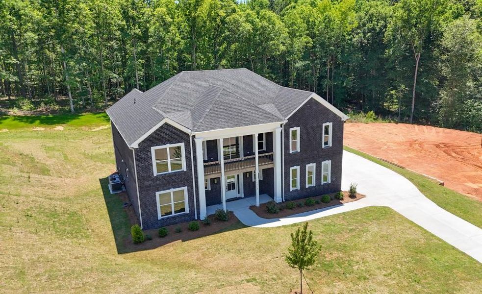 Front exterior of a new home in , Griffin, GA, highlighting curb appeal (Image 28).