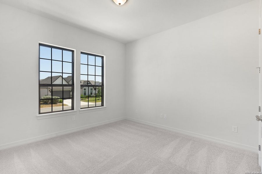 Spacious, unfurnished interior of a new home in El Sonido at Campanas, San Antonio (Image 17).