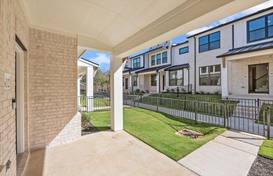 Exterior details and patio area of a home in Monarch on Main, Round Rock (Image 2).