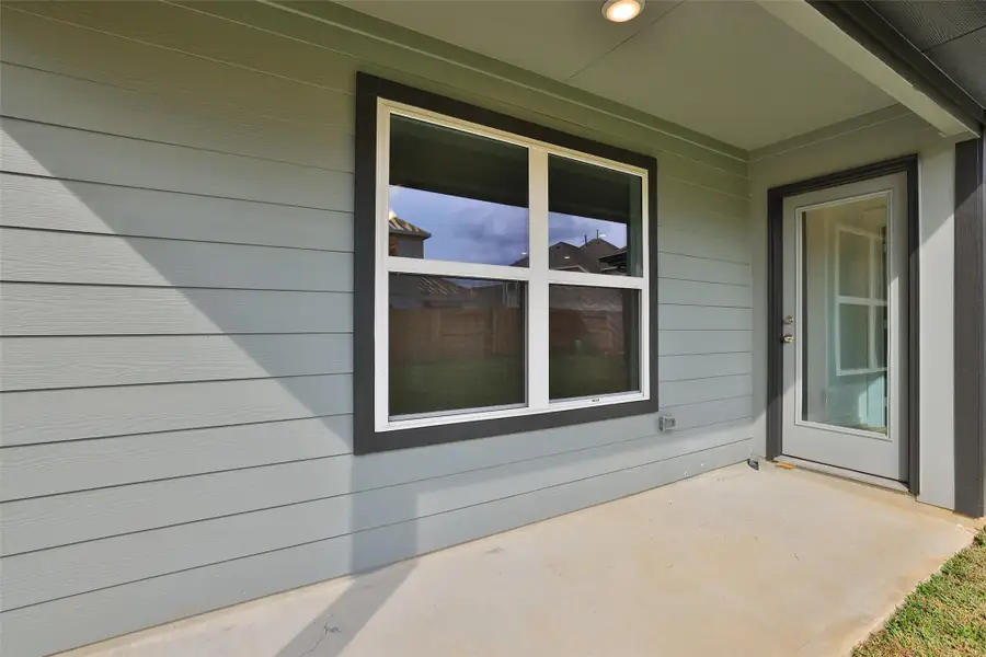 Exterior details and patio area of a home in Sunterra, Katy (Image 3). Exterior details and patio area of a home in Sunterra, Katy (Image 3).