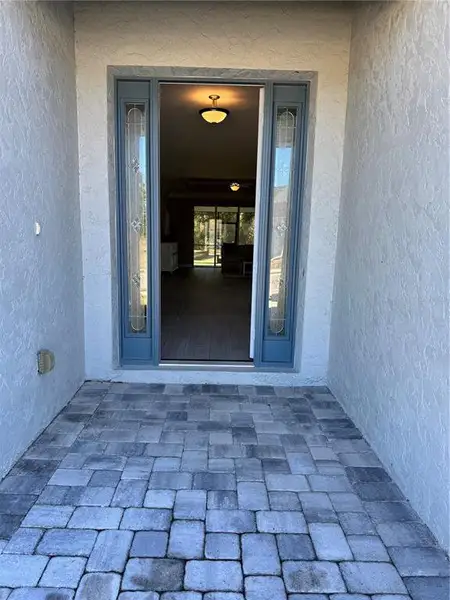 Exterior details and patio area of a home in , Englewood (Image 3).