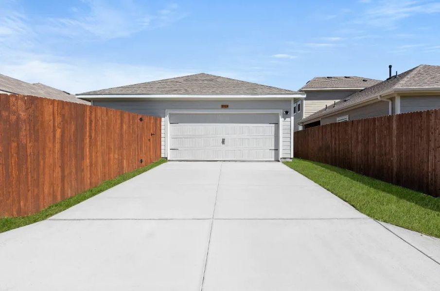 Front exterior of a new home in Heartland, Heartland, TX, highlighting curb appeal (Image 27). Front exterior of a new home in Heartland, Heartland, TX, highlighting curb appeal (Image 27).