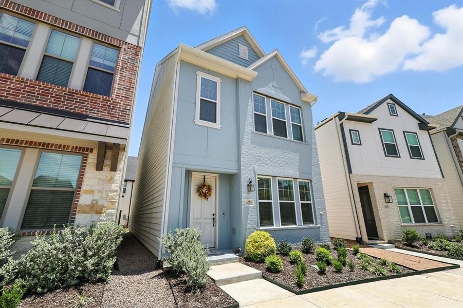 View of front of house with painted brick