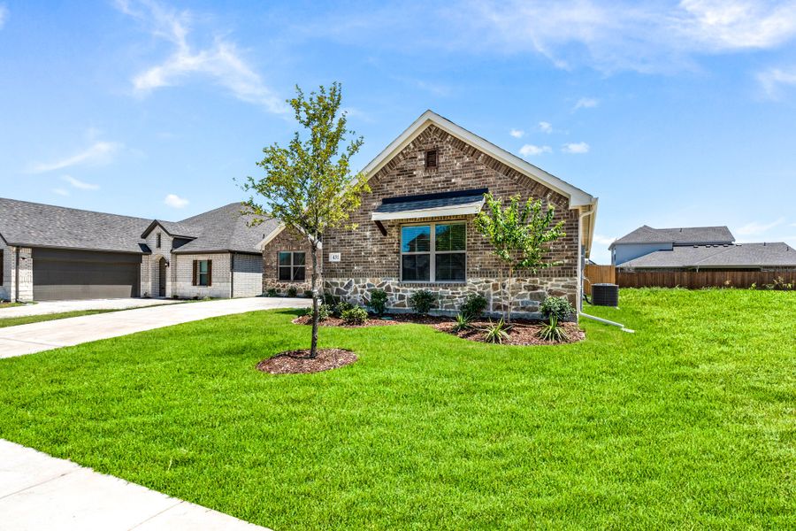 Front exterior of a new home in Summerwood, Red Oak, TX, highlighting curb appeal (Image 20).