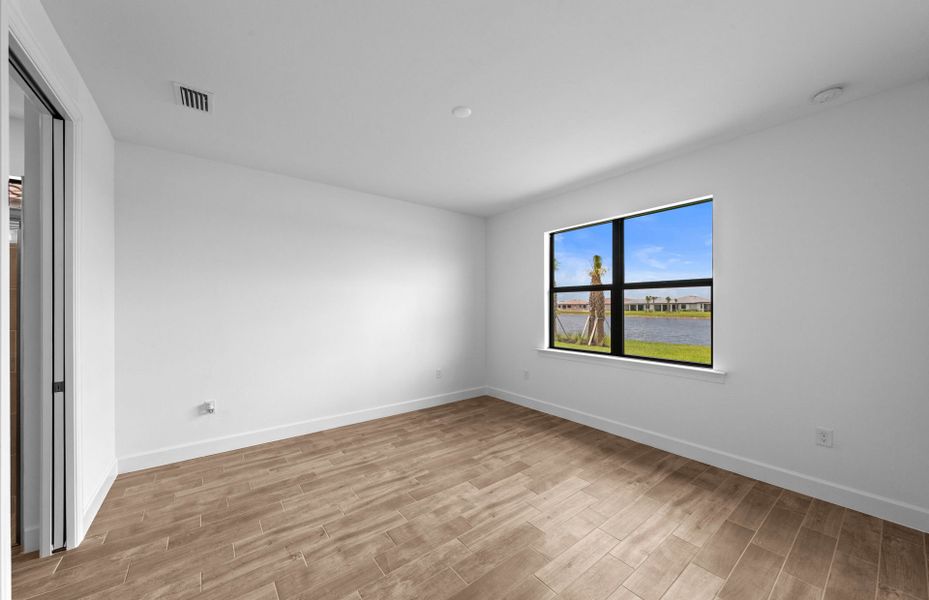 Spacious, unfurnished interior of a new home in Del Webb Naples, Ave Maria (Image 12).