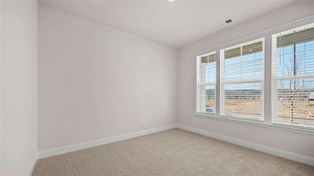 Spacious, unfurnished interior of a new home in Oak Ridge Meadows - Active Adult, Locust Grove (Image 13).