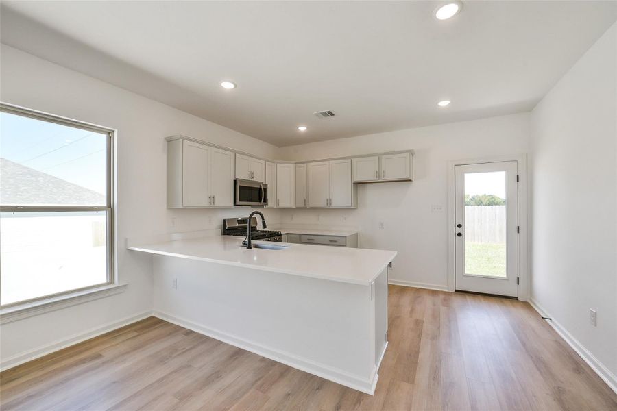 Furnished interior view inside a new home in Mostyn Springs, Magnolia (Image 10). Furnished interior view inside a new home in Mostyn Springs, Magnolia (Image 10).