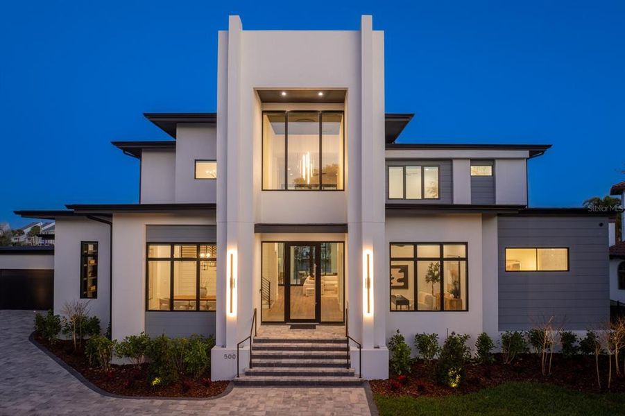 Front exterior of a new home in , St. Petersburg, FL, highlighting curb appeal (Image 26). Front exterior of a new home in , St. Petersburg, FL, highlighting curb appeal (Image 26).