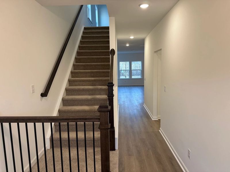 Foyer featuring the AW Collection® Artisan - A natural welcome with relaxed textures and grounded design. Foyer featuring the AW Collection® Artisan - A natural welcome with relaxed textures and grounded design.