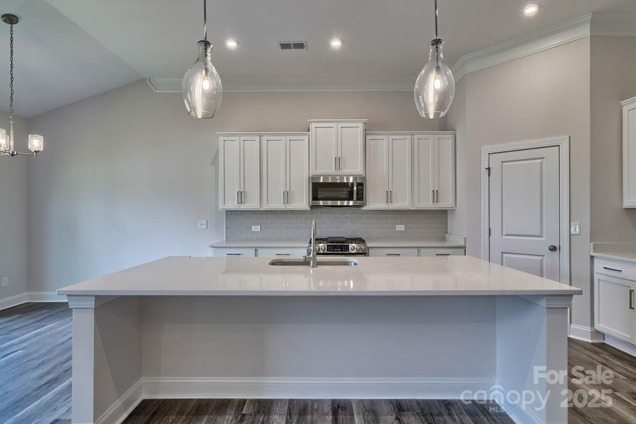 Example Photo Example Photo