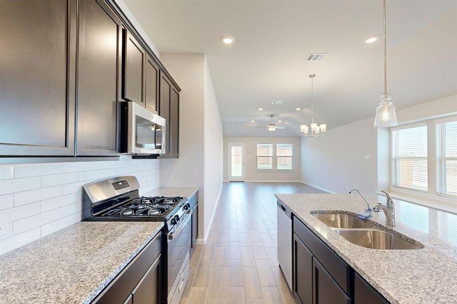 Furnished interior view inside a new home in Mobberly Farms, Pilot Point (Image 6).