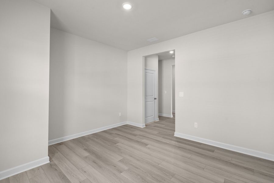 Spacious, unfurnished interior of a new home in Cypress Ridge - The Coastline Series, Longs (Image 24).