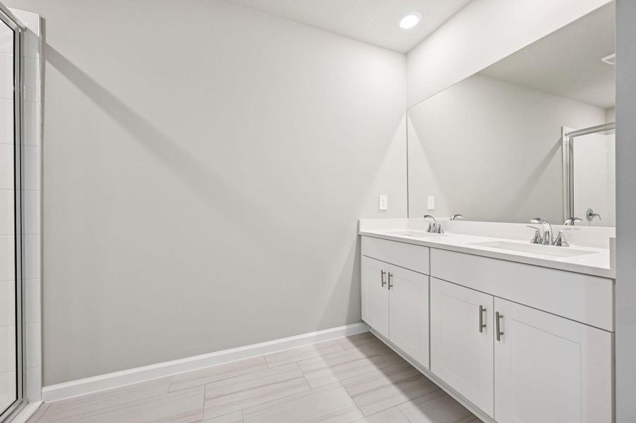 Furnished interior view inside a new home in Hampton Park - Classic Series, Vero Beach (Image 8). Furnished interior view inside a new home in Hampton Park - Classic Series, Vero Beach (Image 8).