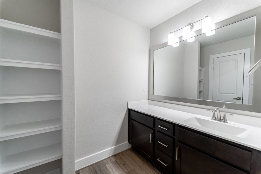 Furnished interior view inside a new home in The Woodlands at Medina Hills, Mico (Image 8).