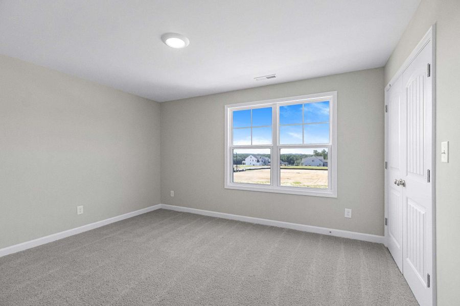 Representative unfurnished interior of a home built from the Magnolia by Caviness & Cates Communities in Bartlett Manor, Youngsville (Image 205).