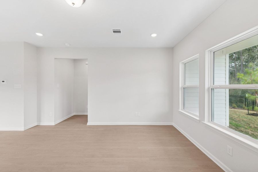 The Cardinal II- Family Room. Photos of home shown are for illustration only; actual features, colors, and upgrades may vary.