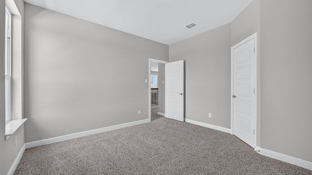 Representative unfurnished interior of a home built from the Tallow by D.R. Horton in Treeline, Justin (Image 29).