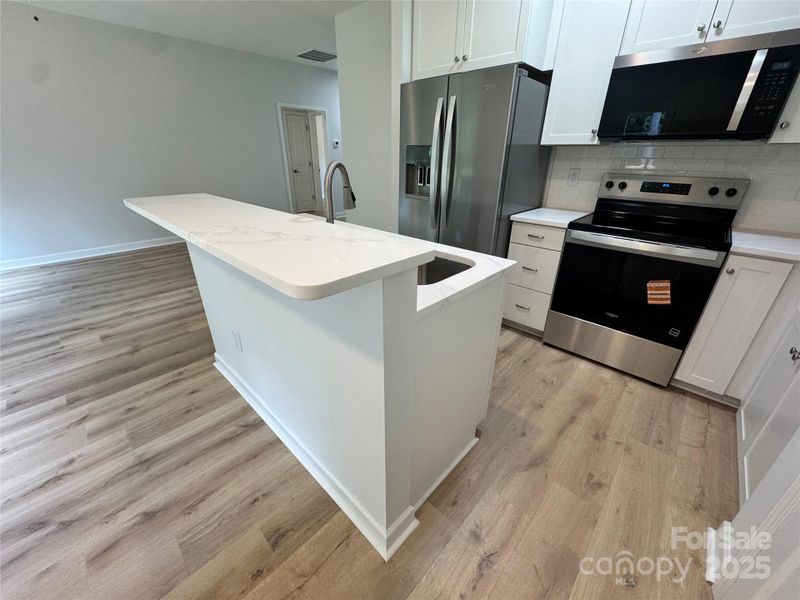 Furnished interior view inside a new home in , Lowell (Image 3).