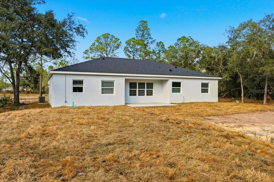 Exterior details and patio area of a home in , Indian Lake Estates (Image 3).