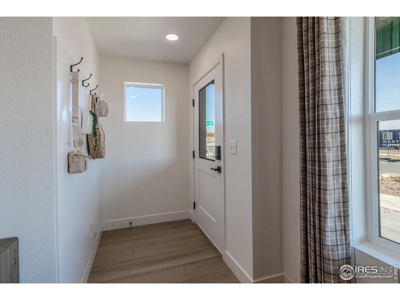 Furnished interior view inside a new home in Prairie Song Story Collection - Single Family Homes, Windsor (Image 23).